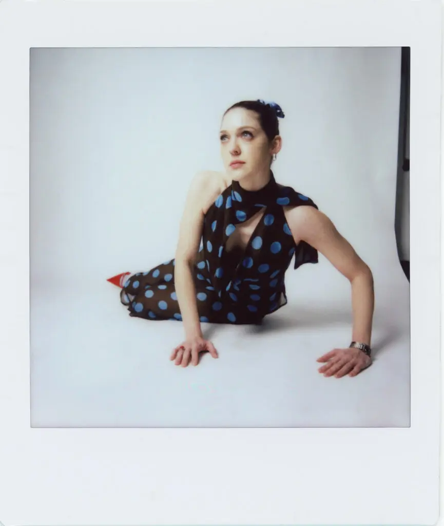Carson Allen Polaroid wearing polka dot outfit