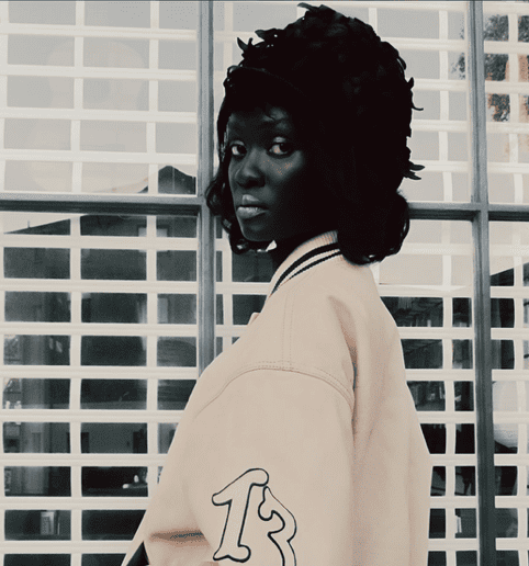 Glossy blue lips and surrealist beauty styling by Aoife Cullen