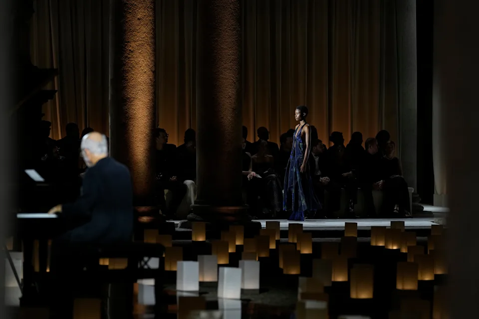Model in blue gown walks Armani farewell runway with pianist